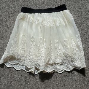 Cream color fluffy mini skirt